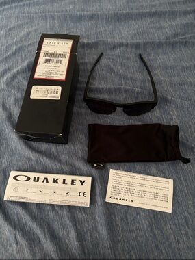 Oakley Black Rectangular Sunglasses with Microbag